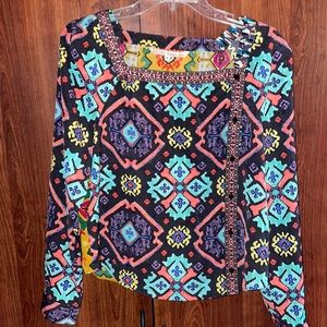 Rachel Roy kaleidoscope blouse. This blouse design was seen on friends!
